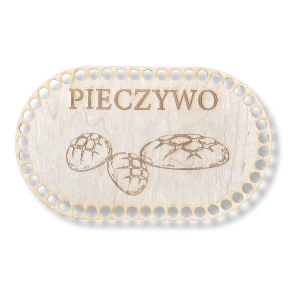 Drewniana baza do koszyka szydełkowego owalna 24,8 x 14,8 cm cięta laserowo z grawerem pieczywo i trzema bochenkami chleba.