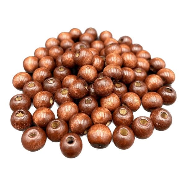 Drewniane Koraliki Brązowe 12 mm do Tworzenia Biżuterii i Rękodzieła 80 szt Zestaw 80 brązowych drewnianych koralików o średnicy 12 mm do tworzenia biżuterii i rękodzieła.