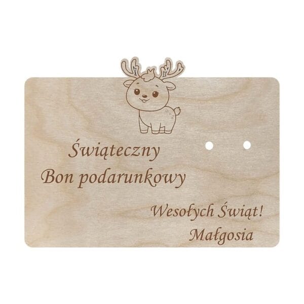 Drewniany bon podarunkowy z reniferem i grawerem „Świąteczny Bon podarunkowy” oraz dwoma otworami na banknoty.