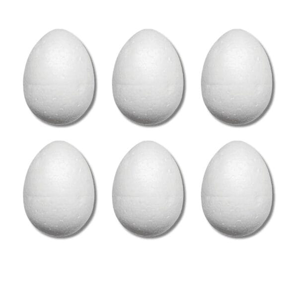 Jajka Styropianowe 9 cm Zestaw 6 szt do Ozdabiania DIY Białe jajka styropianowe 9 cm zestaw 6 szt do ozdabiania DIY ułożone w dwóch rzędach na białym tle.