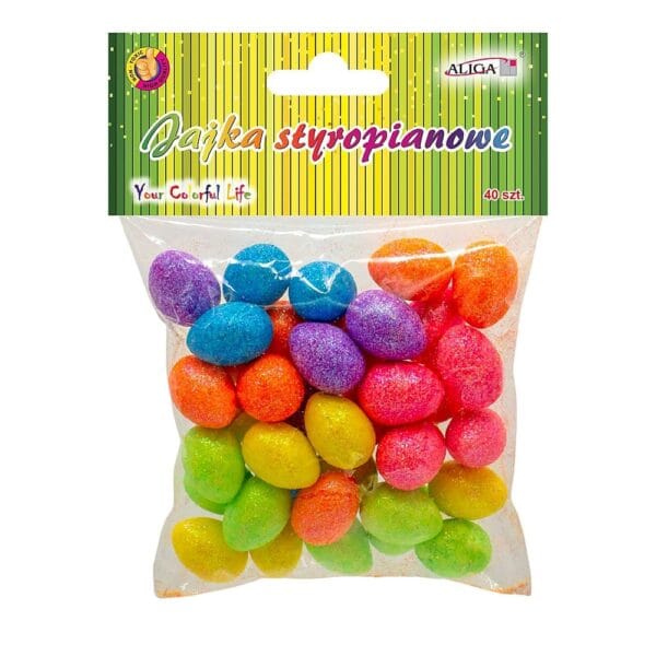 Jajka Styropianowe Brokatowe 2,5 cm 40 szt Dekoracje DIY Zestaw 40 sztuk wielokolorowych jajek styropianowych o wysokości 2,5 cm z brokatowym wykończeniem w foliowym opakowaniu.
