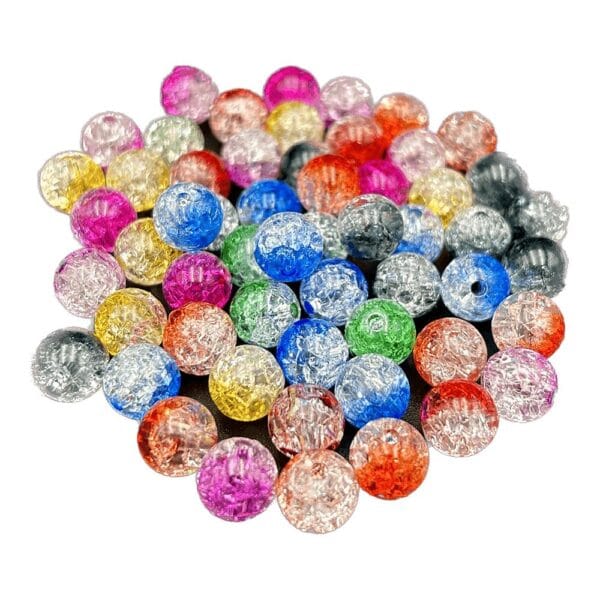 Koraliki Plastikowe Ombre Mix 10 mm 56 szt Koraliki plastikowe ombre mix 10 mm w zestawie 56 sztuk, ułożone w barwny stosik na ciemnym tle.