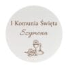 Personalizowany nadruk z imieniem Szymona na białej, okrągłej tablicy powitalnej na Pierwszą Komunię Świętą.