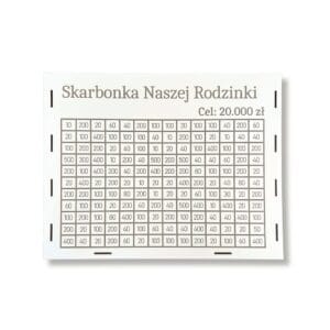 Skarbonka Gigant Naszej Rodzinki na 20000 zł z wygrawerowaną tabelą 154 kafelków do odznaczania oszczędności.